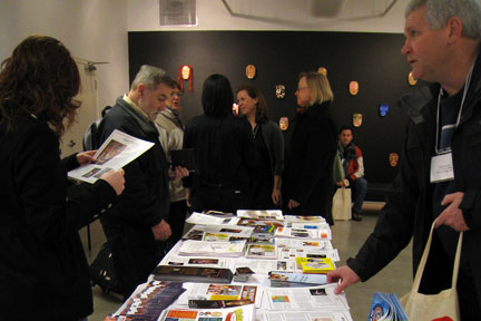 Guests helping themselves to artist material.